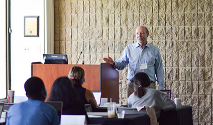 Larry Hedges gives a presentation