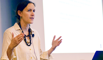 Julia Behrman speaks at a podium