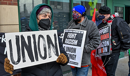 A group of protestors rallied in support of Amazon workers and unionization.