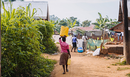 woman carrying water