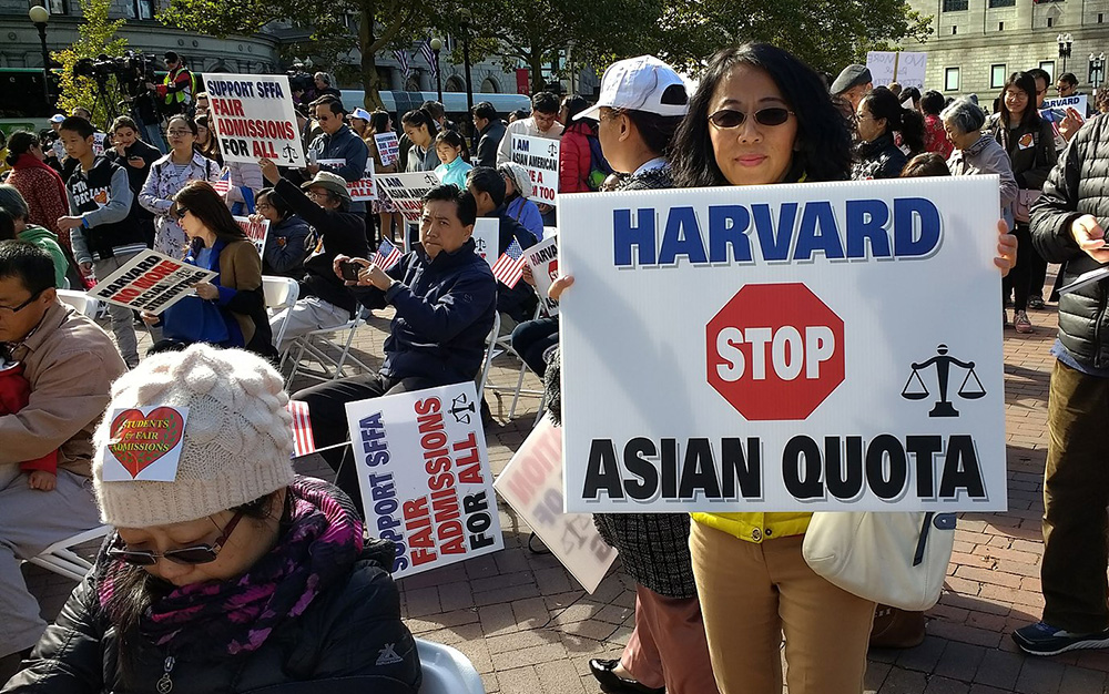 photo of Asian American woman protesting