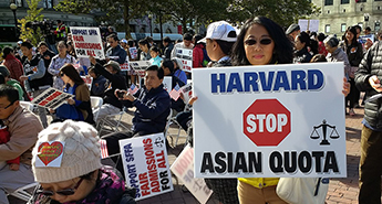Protestors support the lawsuit against Harvard in October 2018.