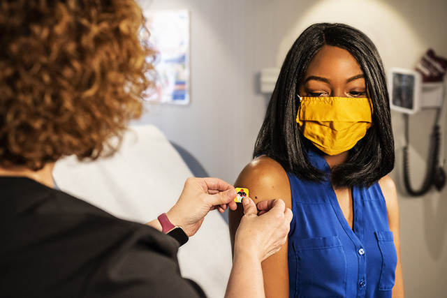 Woman getting vaccine