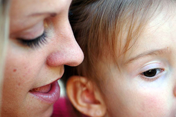 Child listening to mother