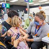 Child receives her COVID-19 vaccination