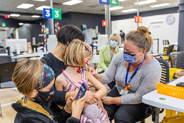 Child receives her COVID-19 vaccination