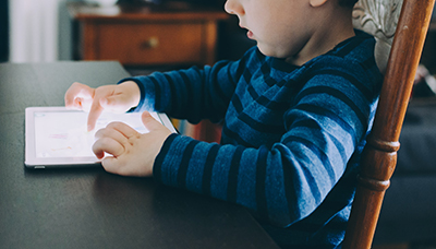 Child looking at iPad