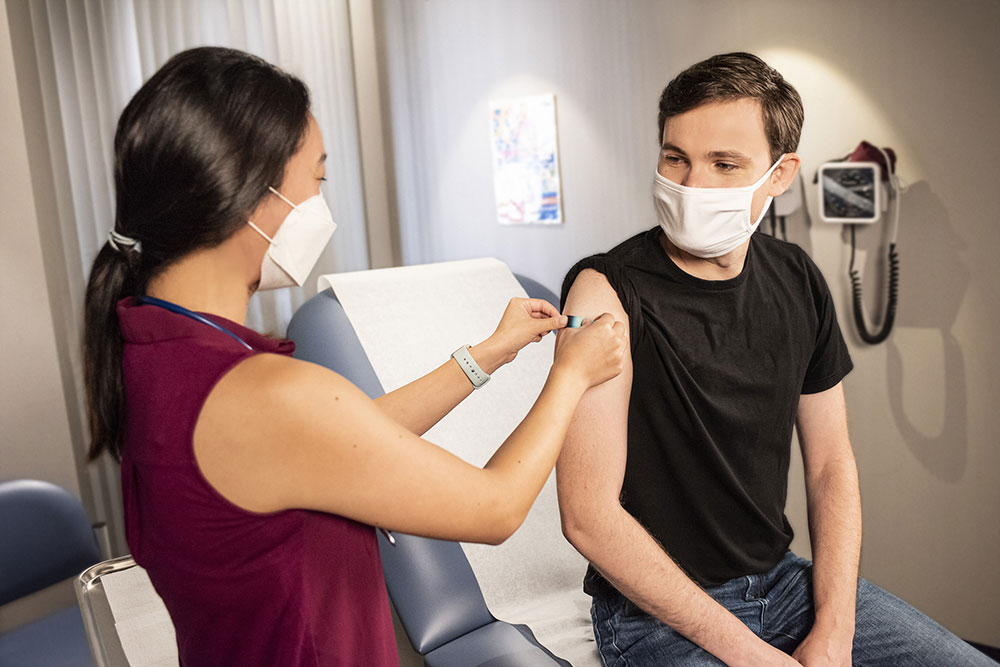 man getting vaccinated