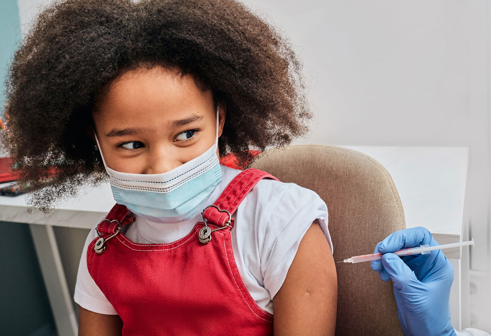 child getting vaccinated