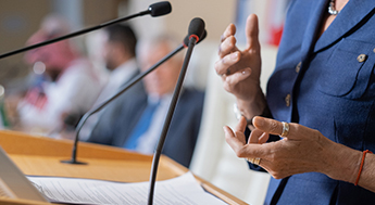 Female politician at podium