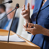 Female politician at podium