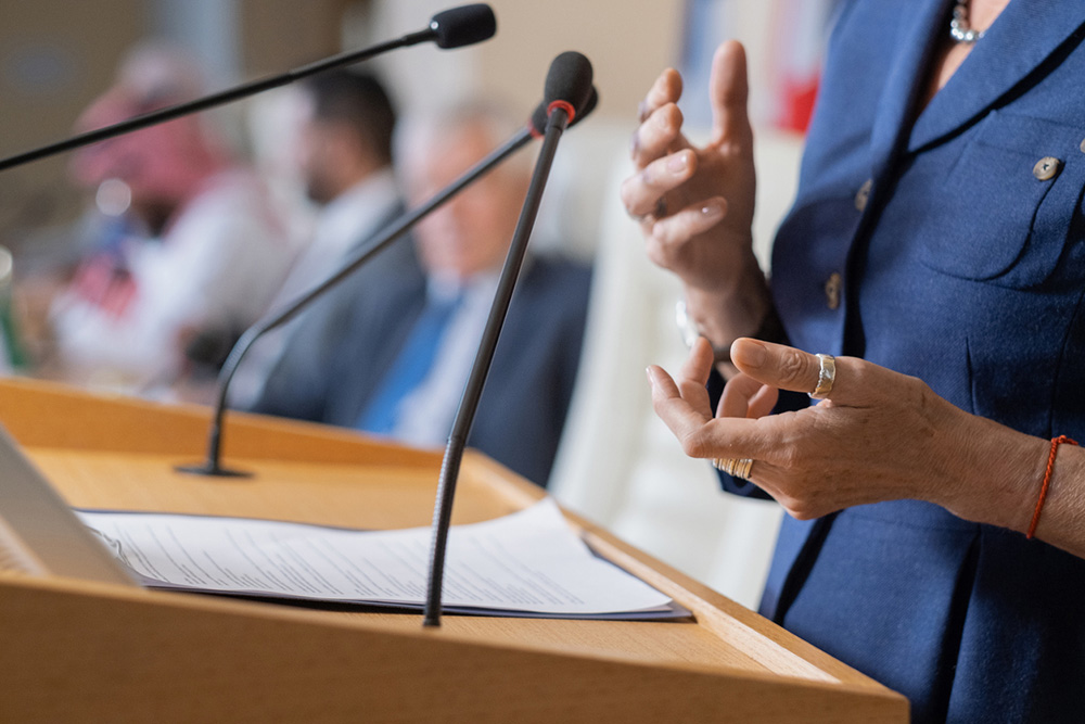 Female politician at podium