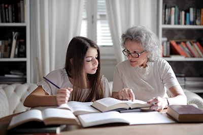 Grandparent teaching grandchild