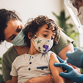 child getting vaccinated