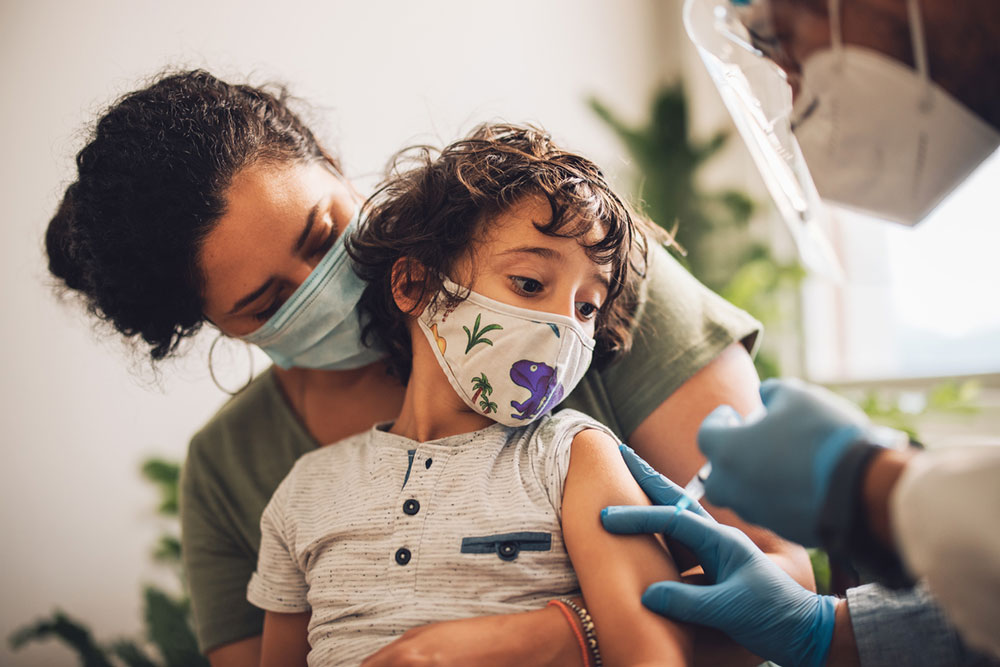 child getting vaccinated