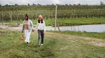 Mother and daughter walking