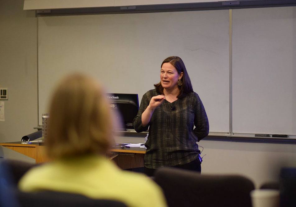 Christine Percheski speaking at Northwestern