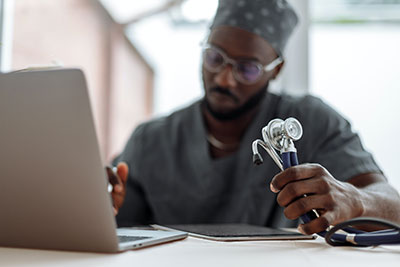 Medical professional holding a stethoscope