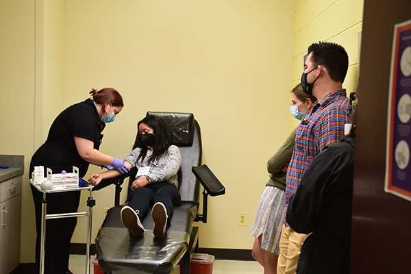 SIBASS participants learn to draw blood 