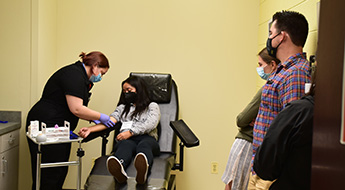 SIBASS participants learn to draw blood 