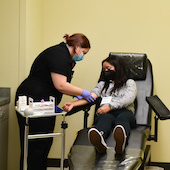 SIBASS participants learn to draw blood 