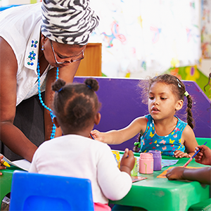 pre-K teacher and students