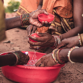 Women cleaning with water 