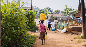 woman carrying water
