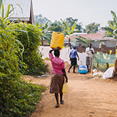 woman carrying water