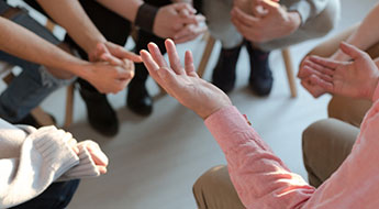 group therapy, closeup on hands