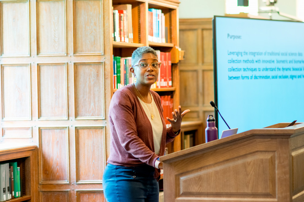 Bridget Goosby speaking at a podium