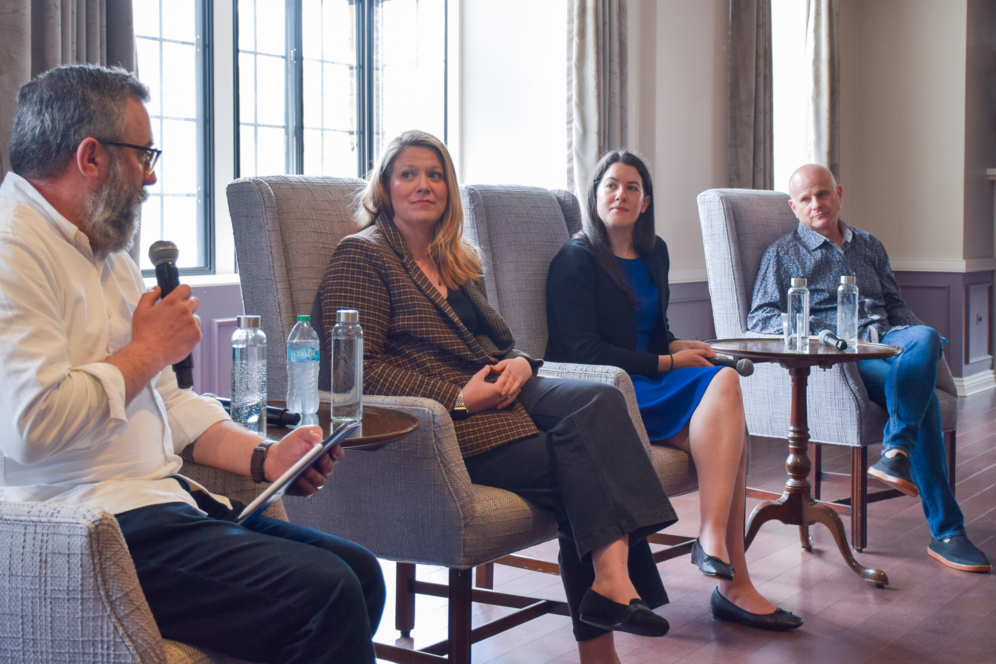 Beth Tipton, Katie Insel, and Dean Karlan speak at an IPR panel.
